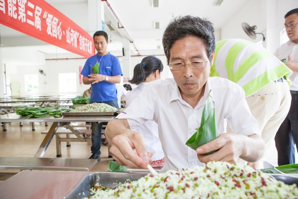 弘扬传统文化，共享浓情端午——记第三届“爱国心·3868la银河总站情”包粽子角逐